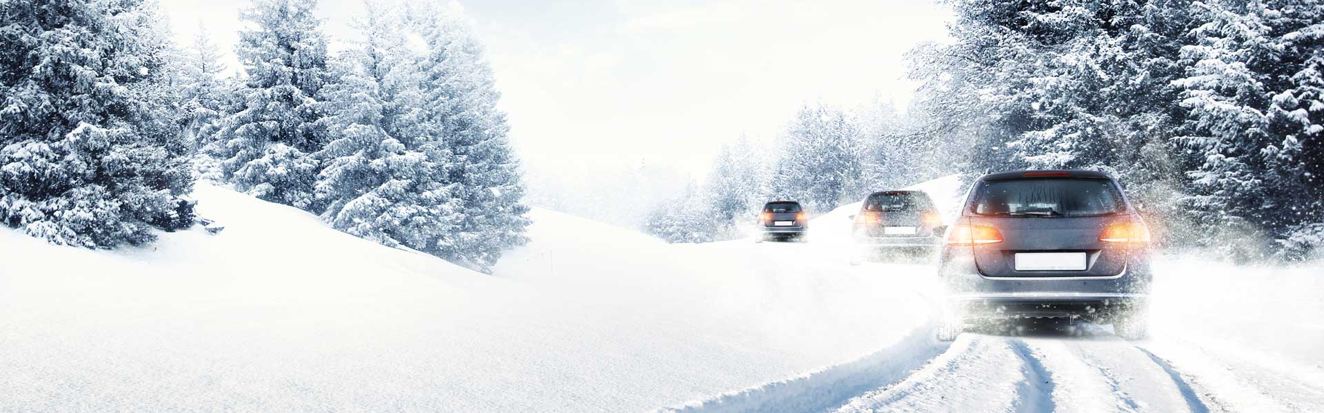 cars driving in snow