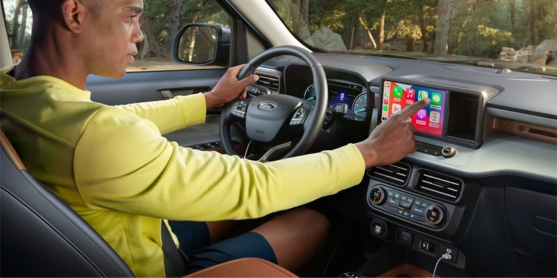 Person driving 2023 Ford Maverick