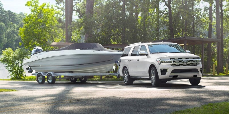 2024 Ford Expedition® towing a boat