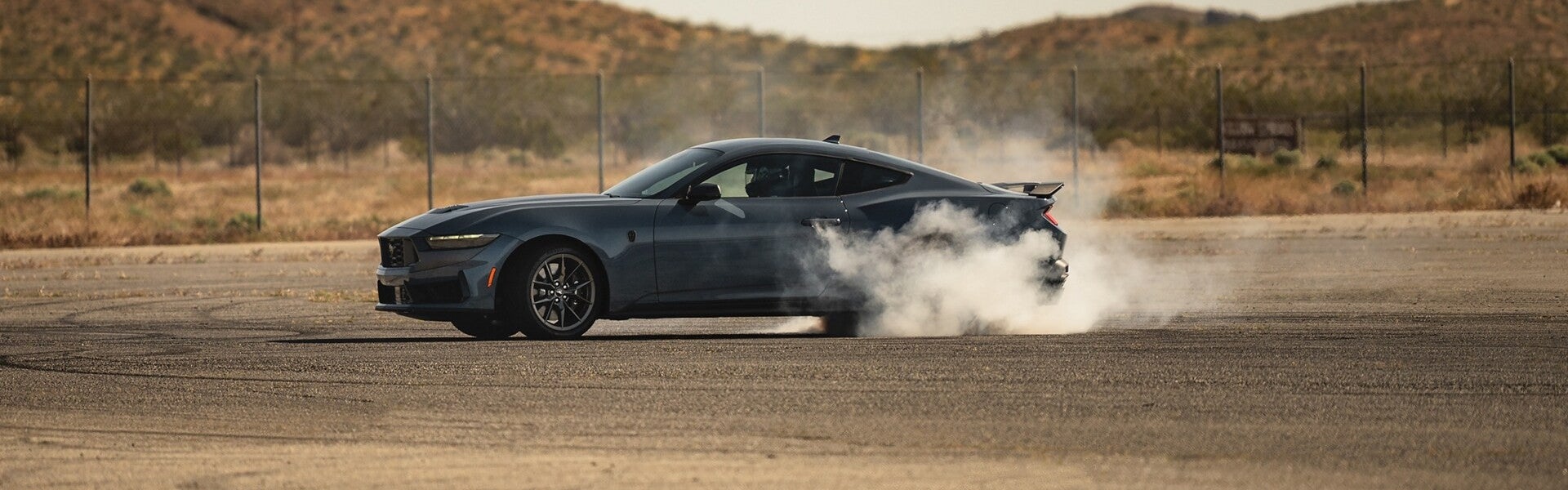 Ford Mustang kicking up dust