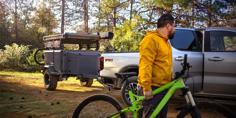 2024 Ford Ranger towing trailer man with bike