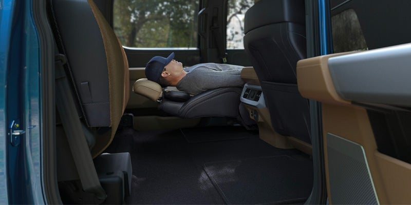 2025 Ford F-250 man reclining in seat